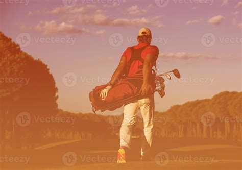 Golfer Walking And Carrying Golf Bag 10872078 Stock Photo At Vecteezy
