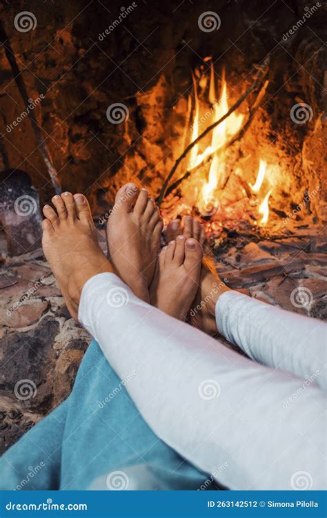 Pov Of Couple Enjoying Fireplace At Home In Barefoot Relax Leisure Activity Indoor Romantic