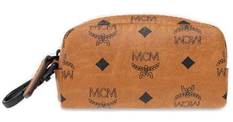 Mcm Logo Printed Zipped Pouch In Brown Lyst