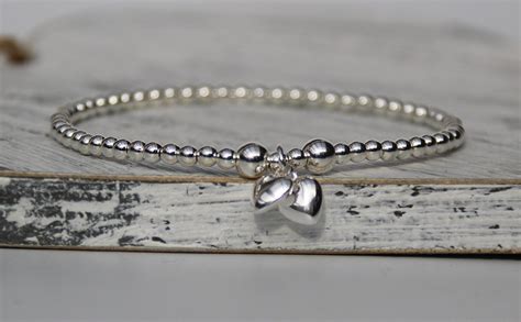 Sterling Silver Bead Stretch Bracelet With A Double Puff Heart Etsy Uk