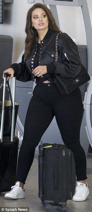 Ashley Graham Flashes Some Serious Leg Thanks To A Thigh High Slit