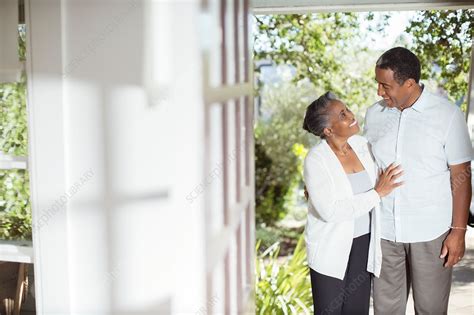 Senior Couple Hugging On Patio Stock Image F014 5670 Science