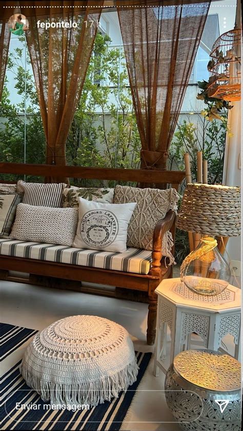 A Living Room Filled With Lots Of Pillows And Furniture