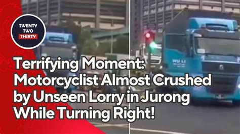 Terrifying Moment Motorcyclist Almost Crushed By Unseen Lorry In