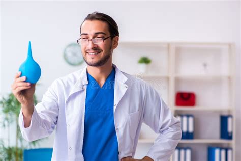 Young Male Doctor Gastroenterologist Working In The Clinic Stock Photo