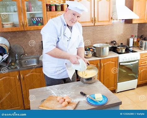 Cook man in kitchen stock photo. Image of prepare, professional - 12326280