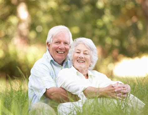 Senior Couple Sitting On A Park Bench Stock Image Image Of Passion