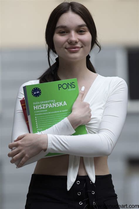 Lovely Brunette Hottie Teasing With Her Amazing Body On The Couch Photos