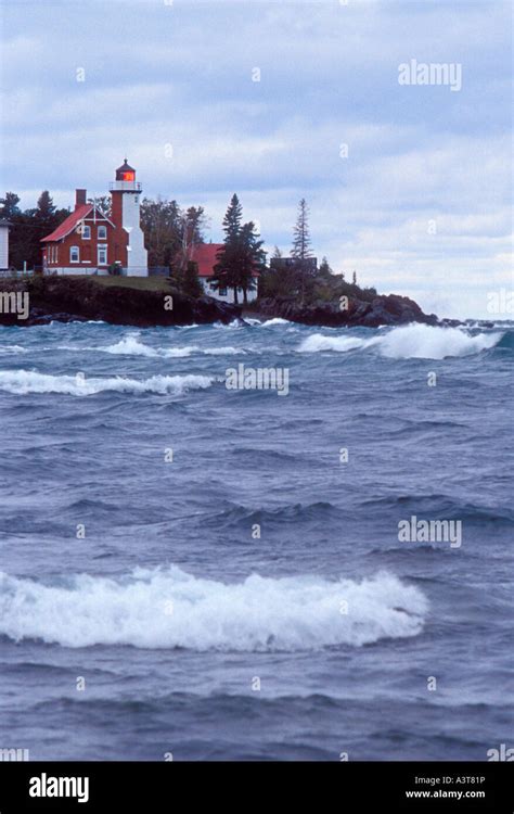 The Eagle Harbor Lighthouse In Eagle Harbor Mich And A Stormy Lake