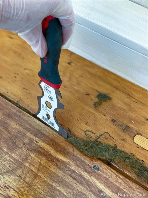 How To Fill Gaps In Wood Floors With Oakum Wood Plank Decor Beam