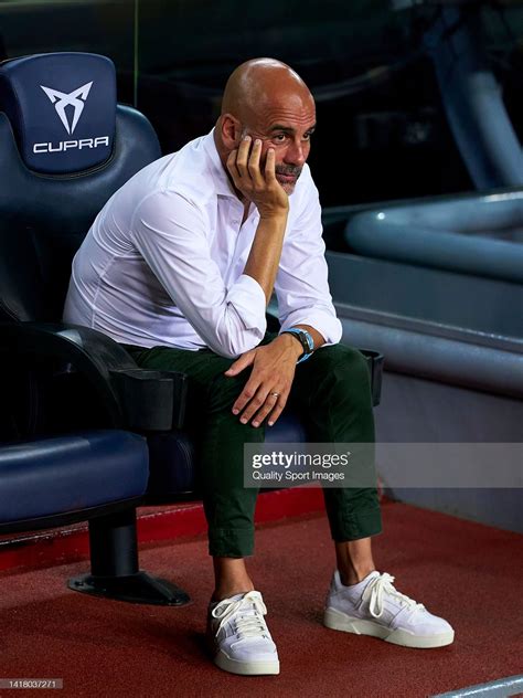 Pep Guardiola, head coach of Manchester City looks on prior to the ...