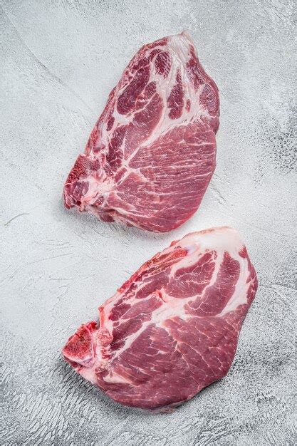 Premium Photo Raw Pork Neck Meat Steaks