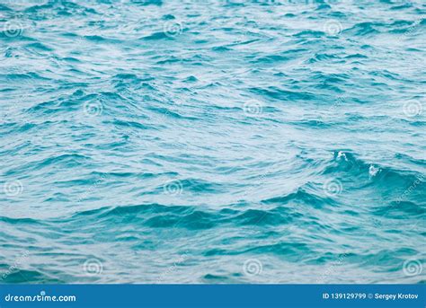 Photo Closeup Of Beautiful Clear Turquoise Sea Ocean Water Surface With