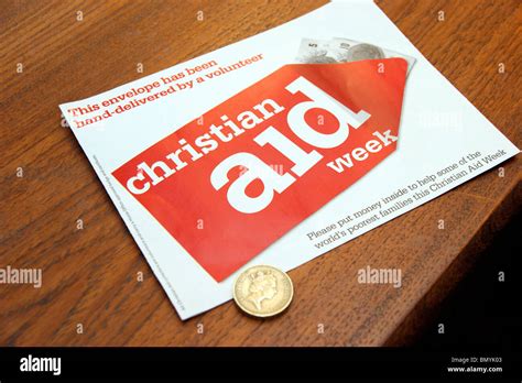 £1 Coin Donation With Charity Collecting Envelope For Christian Aid