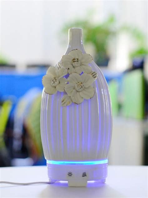 Chinanew Design Carved Flower Essential Oil Ceramic Electric Difuser