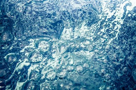 Abstract Water Whirlpool With Bubbles And Ripples Stock Photo Image