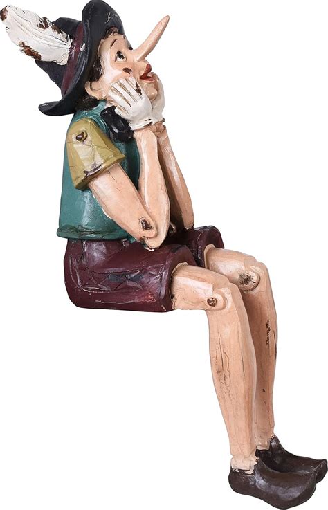 Amazon de Märchenfigur Pinocchio Figur Kantensitzer Skulptur