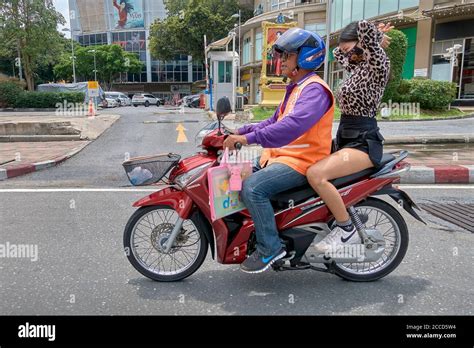 Thailand Motorcycle Taxi And Female Passenger Stock Photo Alamy