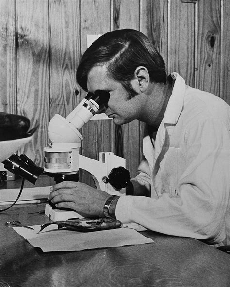 Vintage - Scientist | Scientist looking through microscope. | Florida ...