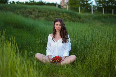 Beautiful Fashionable Brunette Woman Adult Posing In The Park On The