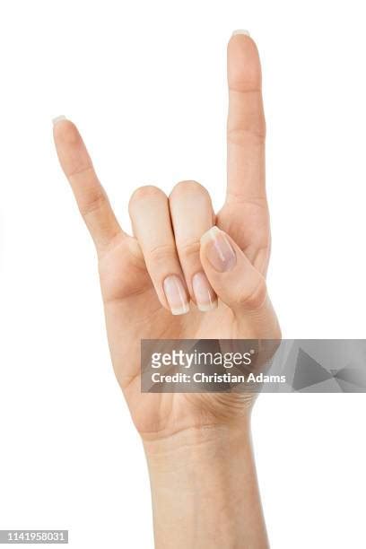 Rock Roll Hand Symbol Photos And Premium High Res Pictures Getty Images