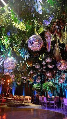 Wedding Backdrop Decor: Disco Balls and Flowers with Neon Sign