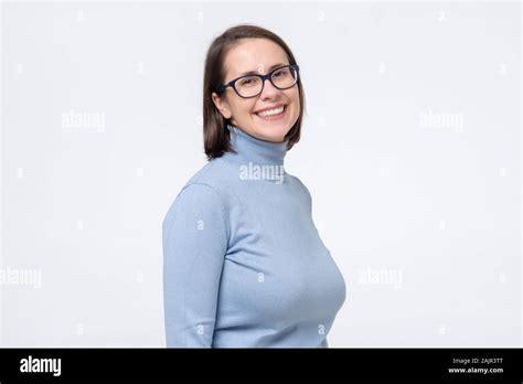Attractive Caucaisn Mature Woman In Glasses Smiling Looking At Camera