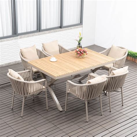 Pieces Outdoor Dining Set With Wood Top Trestle Table And Woven