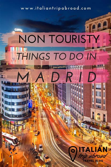 A City Street At Night With The Words Non Touristy Things To Do In Madrid