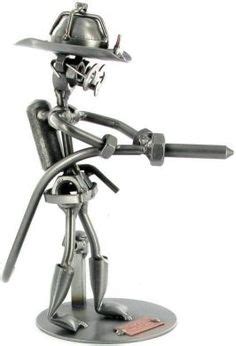 Nuts And Bolts Metal Art Fireman With Hose Nuts And Bolts Figure