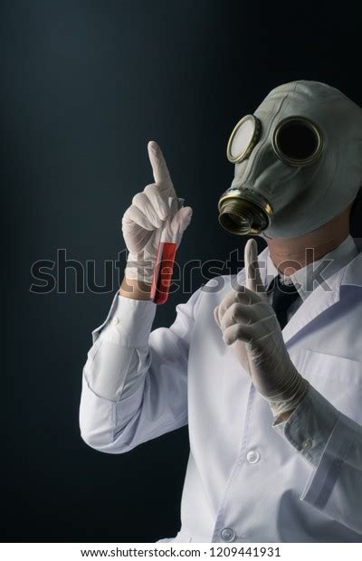 Evil And Creepy Science Experiment Concept A Scary Scientist In Gas