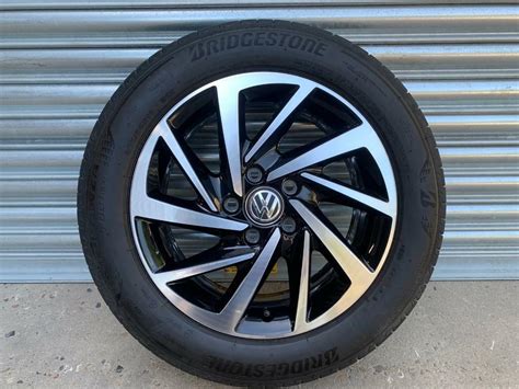 VW GOLF MK7 SPORTSVAN WOODSTOCK 16 GLOSS BLACK DIAMOND CUT ALLOY