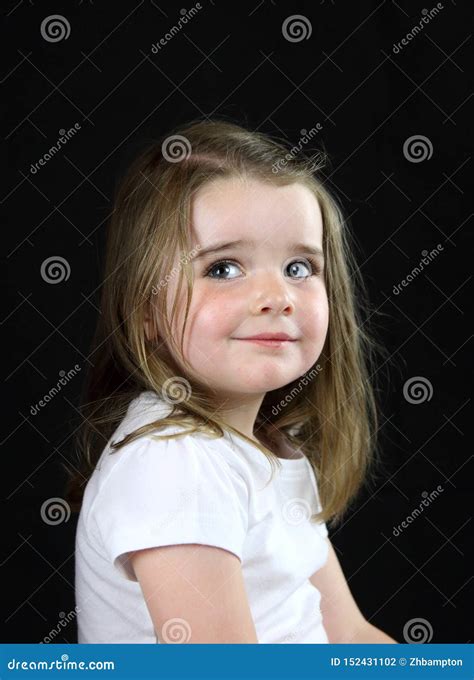 Young Girl With Cheeky Look Stock Photo Image Of Toddler Smiling