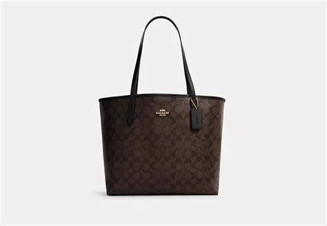 Coach Outlet® City Tote In Signature Canvas