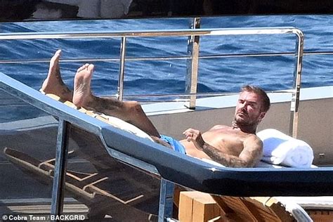 Shirtless David Beckham Shows Off His Muscular Tattooed Physique On