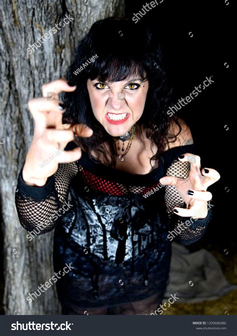 Стоковая фотография Sexy Young Brunette Punk Poses Corset Shutterstock