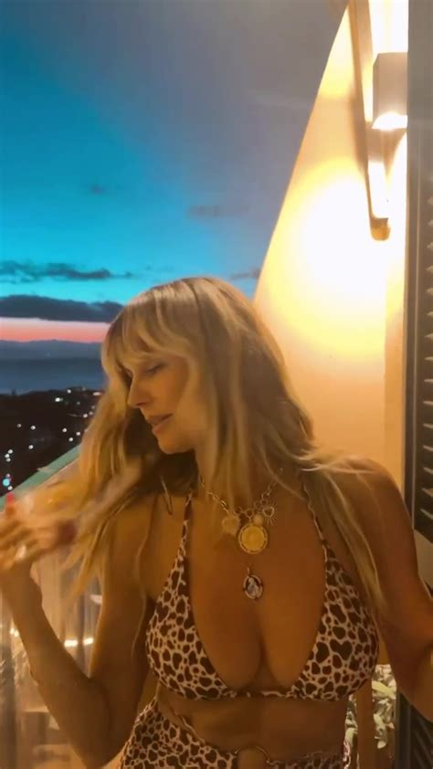 AGT S Heidi Klum Shakes Her Cleavage At The Camera In Tiny Leopard Print Bikini Across The