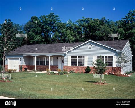 1960s 1970s Single Story Ranch Style Home With Lawn Stock Photo Alamy