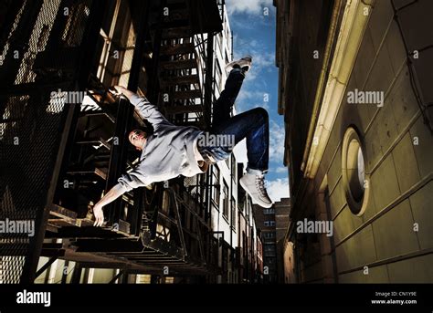 Young man breakdancing Stock Photo - Alamy