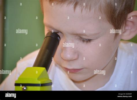 the boy with a microscope Stock Photo - Alamy