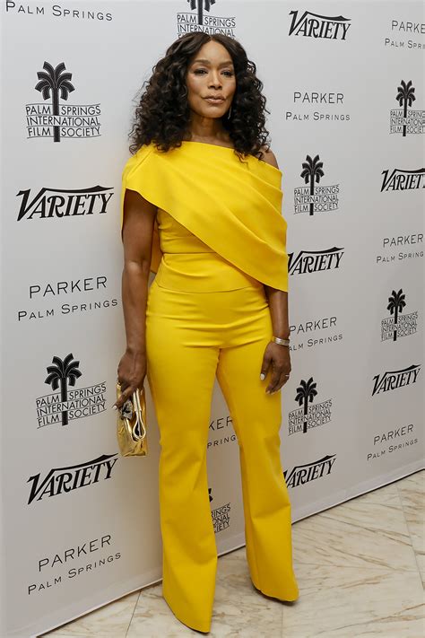 Angela Bassett Has A Monochrome Moment In A Bright Yellow Jumpsuit