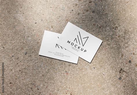 Two Horizontal Business Card Mockup On A Concrete Background With Sun