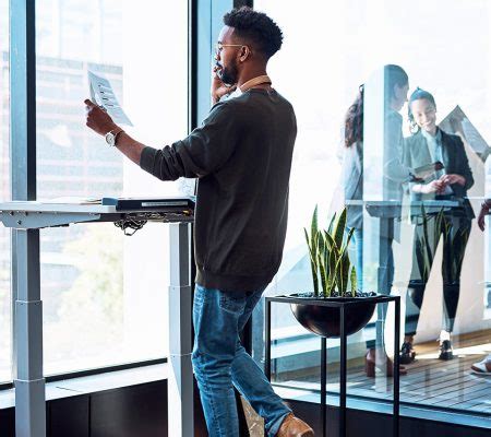 Standing Desk Ergonomics: 7 Benefits of Standing at Work - Orthopaedic Hospital of Wisconsin