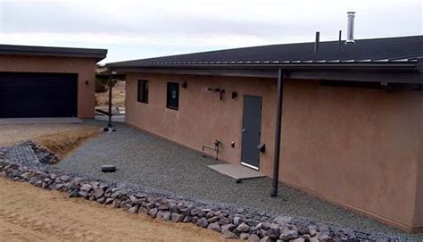 Shed Roof on House and Garage - Earthen Touch Natural Builders