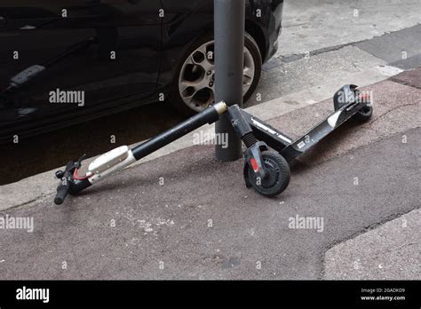 A Broken Electric Scooter Abandoned Along Rue De La Loge In Marseille