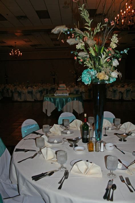 Ivory and Tiffany Blue centerpiece close up. | Home wedding decorations ...