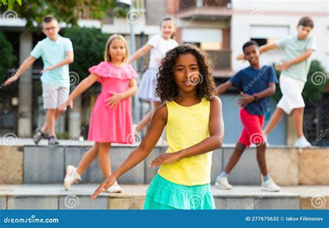 Young Boys and Girls Dancing Outdoors Stock Photo - Image of children ...