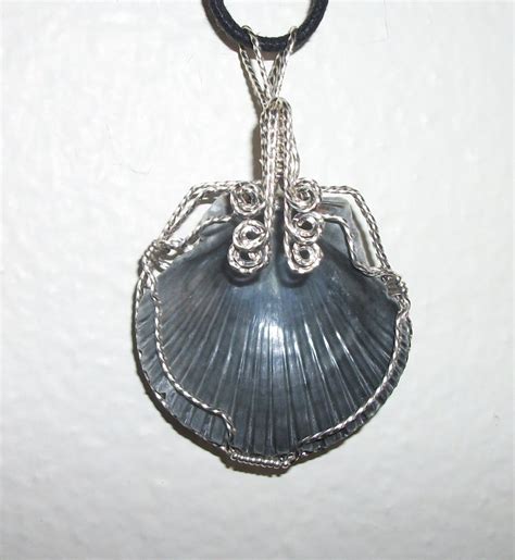 Natural Sea Shell Pendant Wire Wrapped In Silver Filled Wire