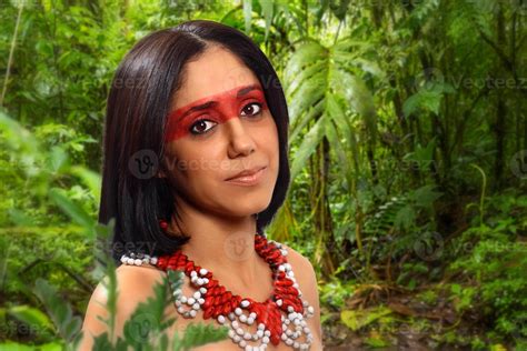 Smiling Brunette Model In Brazilian Indian Costume And Makeup Holding A