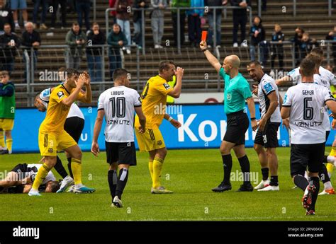 Referee Nicolas Winter Shows The Red Card To Player Luca KERBER Left 1